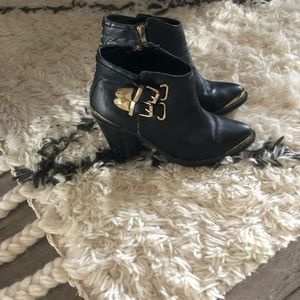 Rocker Black leather heel booties /gold accent